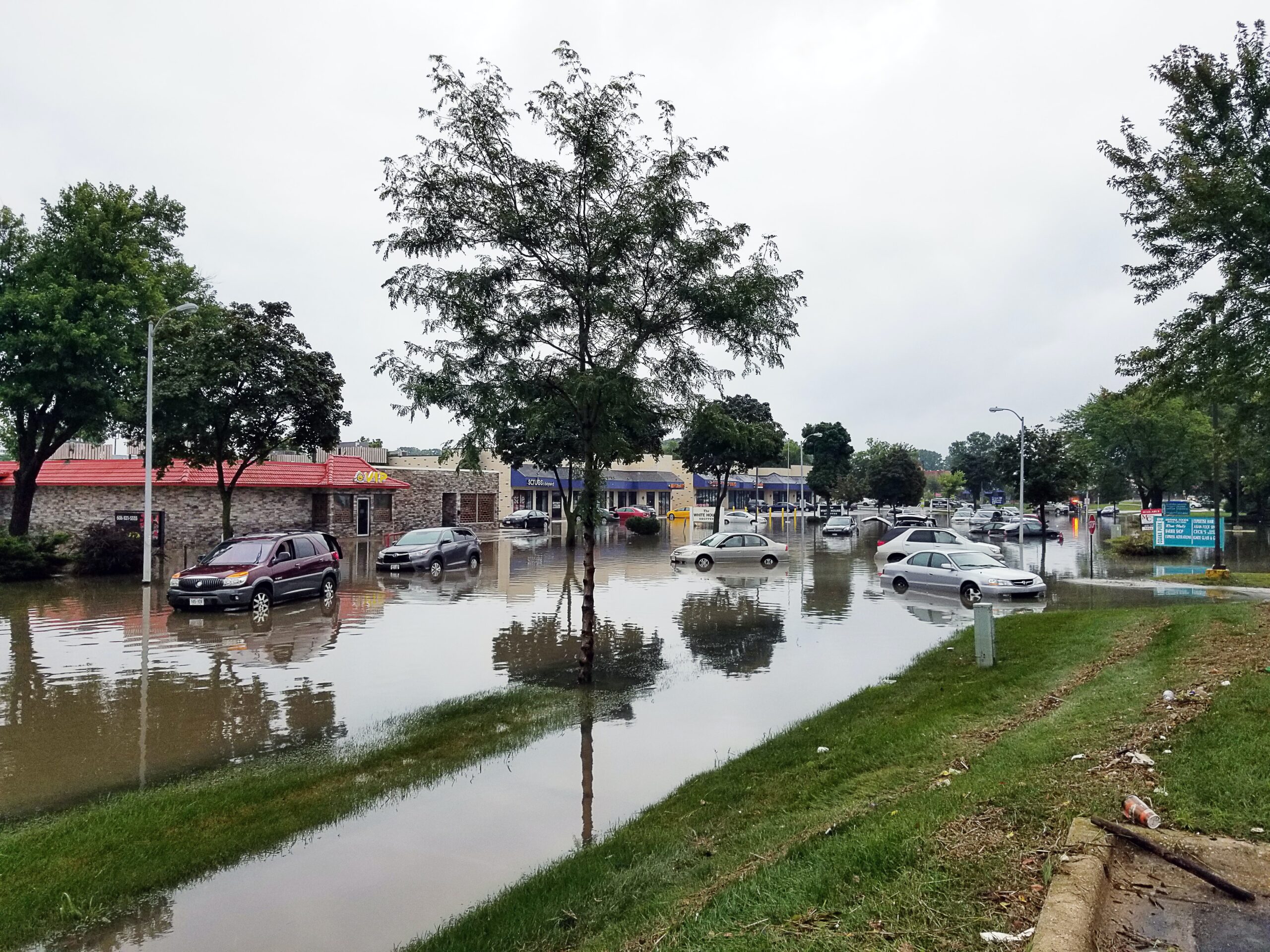 cars on flooded street